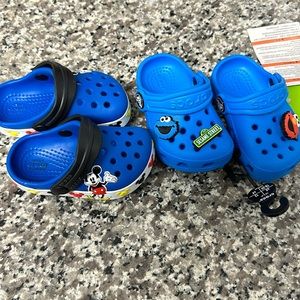 2 pairs of 4c baby toddler crocs Mickey and Sesame Street